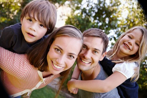portrait-smile-family-outdoor-nature-love-bonding-piggyback-siblings-together-happy-parents-face-carrying-kids-garden-connection-with-mother-father-children_590464-328307